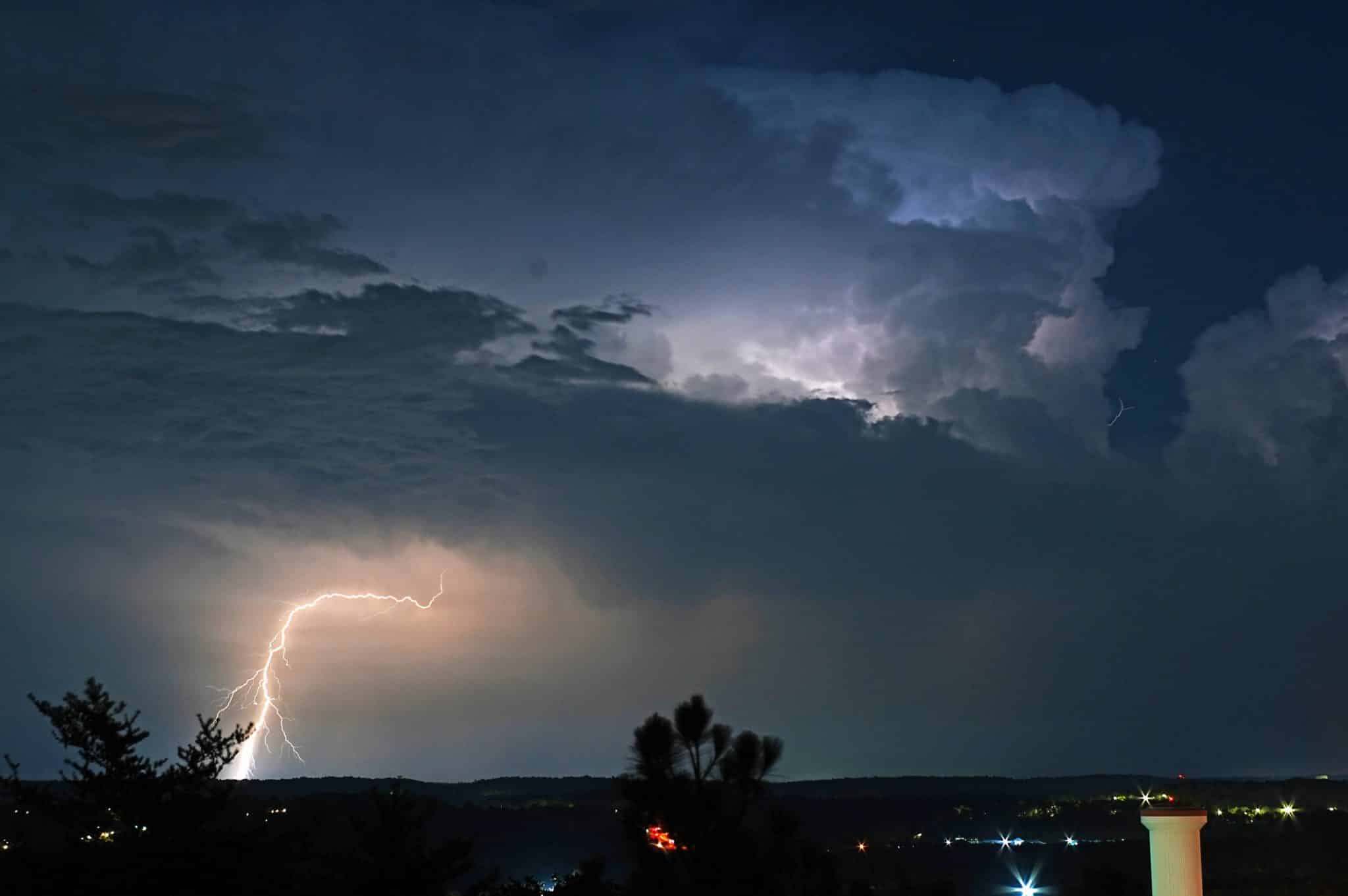 Night photo of Birmingham as lightning strikes.